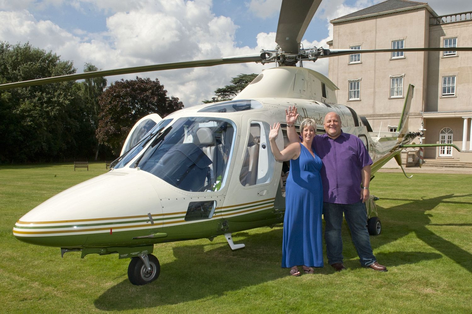 The Jackpot win . . . Gillian and Adrian celebrated picking up their Camelot cheque with a helicopter ride