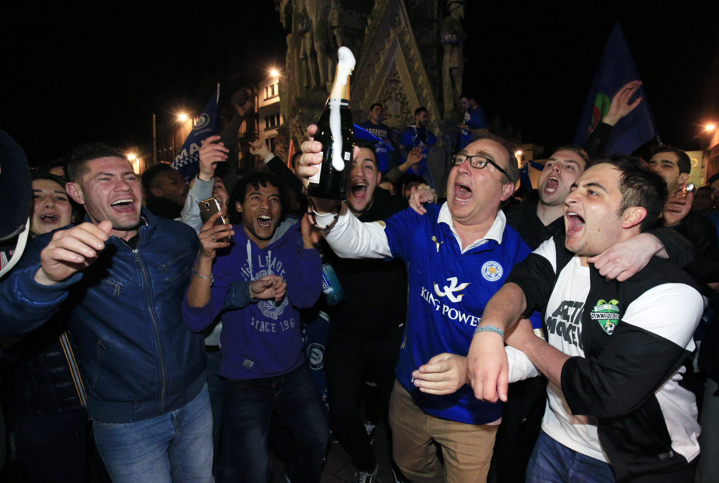 Leicester fans party as they celebrate becoming Premier League champions