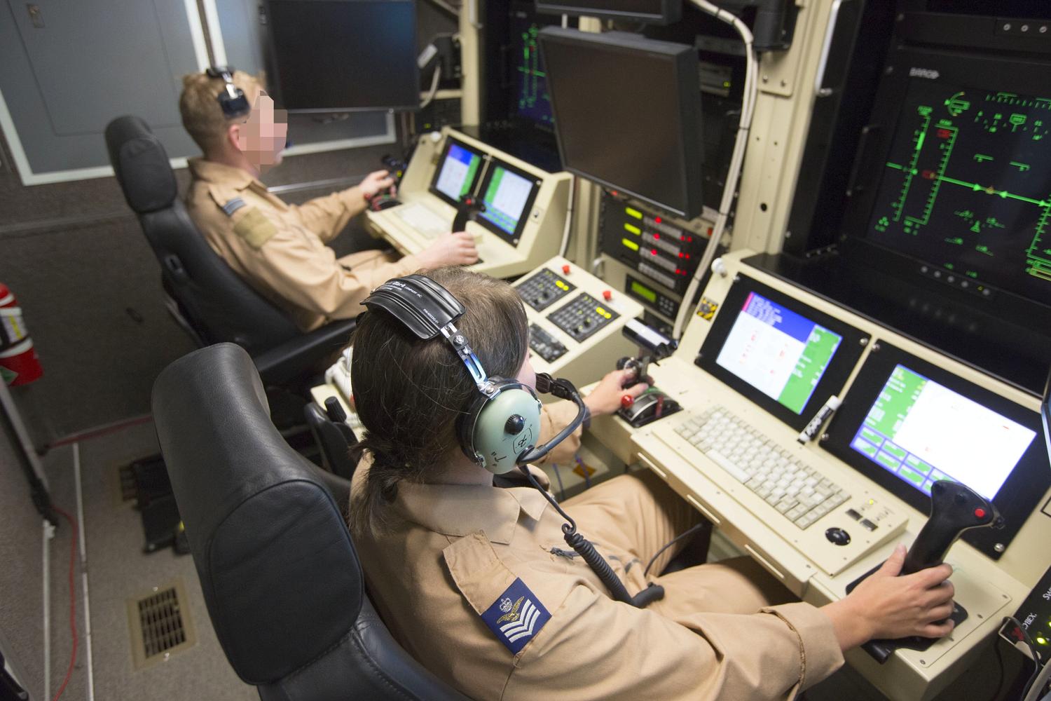 Flight crews at the control desk of The Reaper