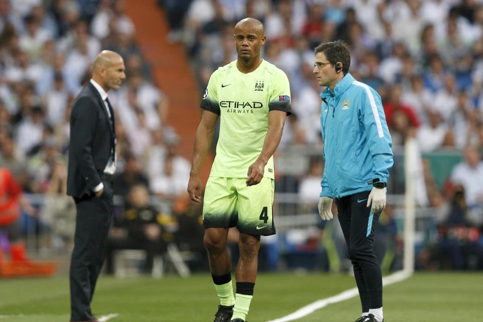  Kompany is devastated as he is brought off in the Champions League semi-final