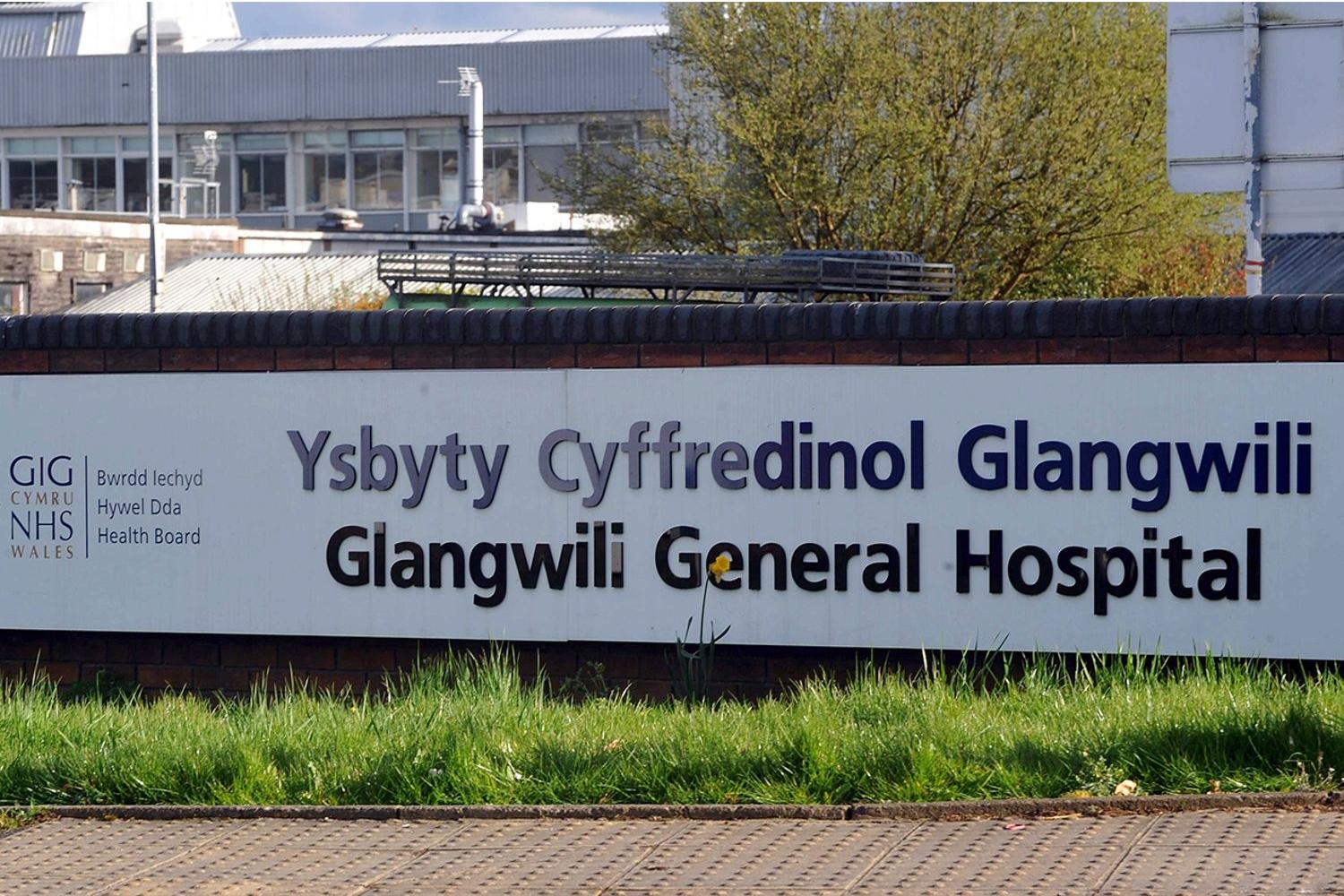 The former businessman alleges neglect and failure of care at Glangwili Hospital, Carmarthen