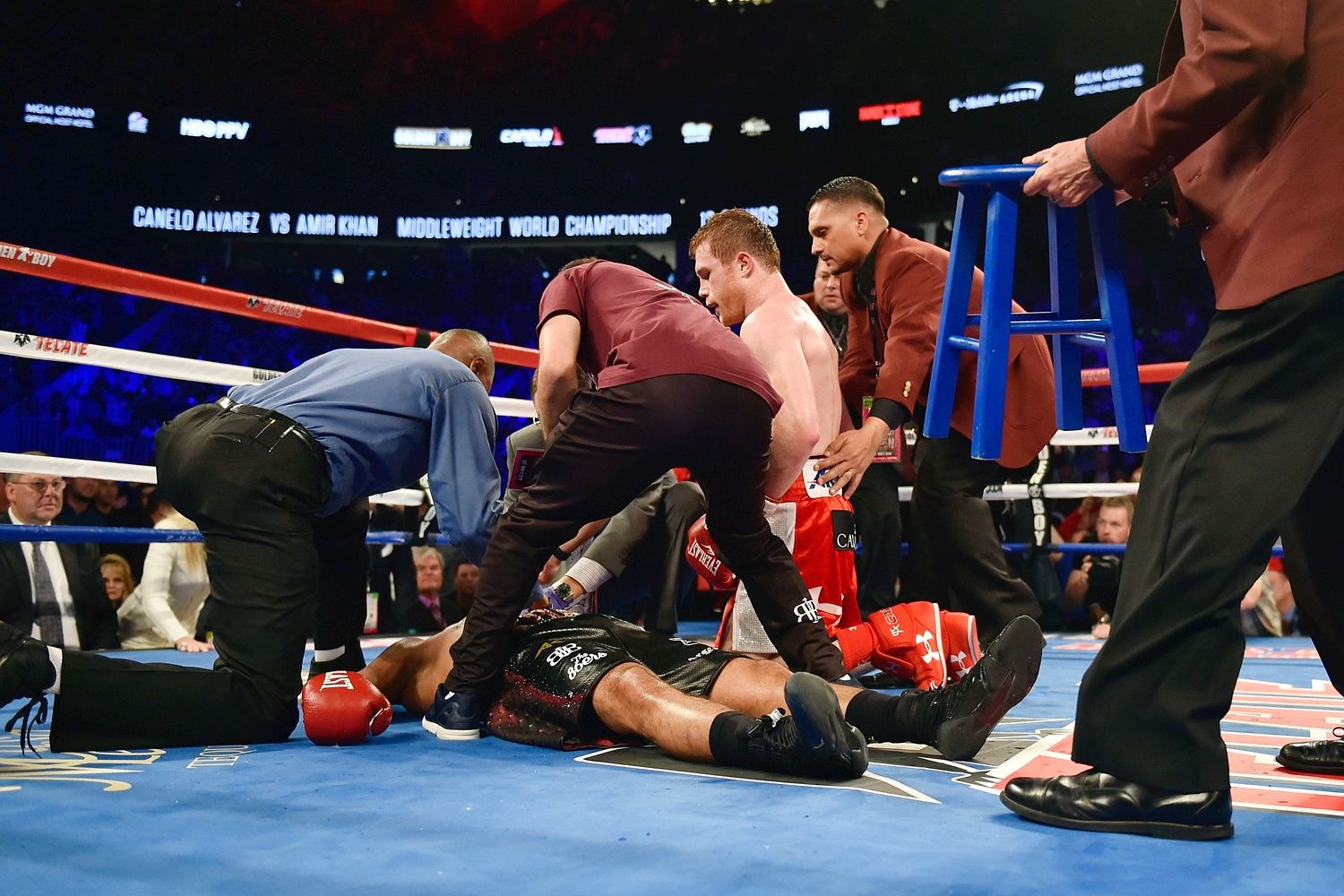 Khan's team rushed to his side after being floored by the Mexican