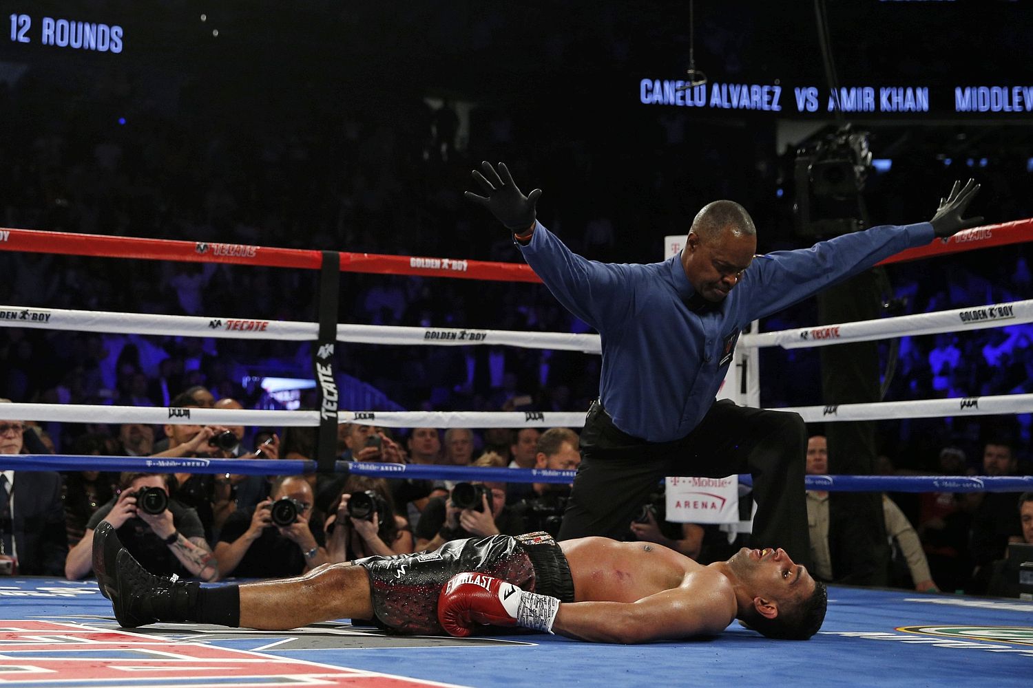 The contest was waved off by the referee as Canelo retained his world title