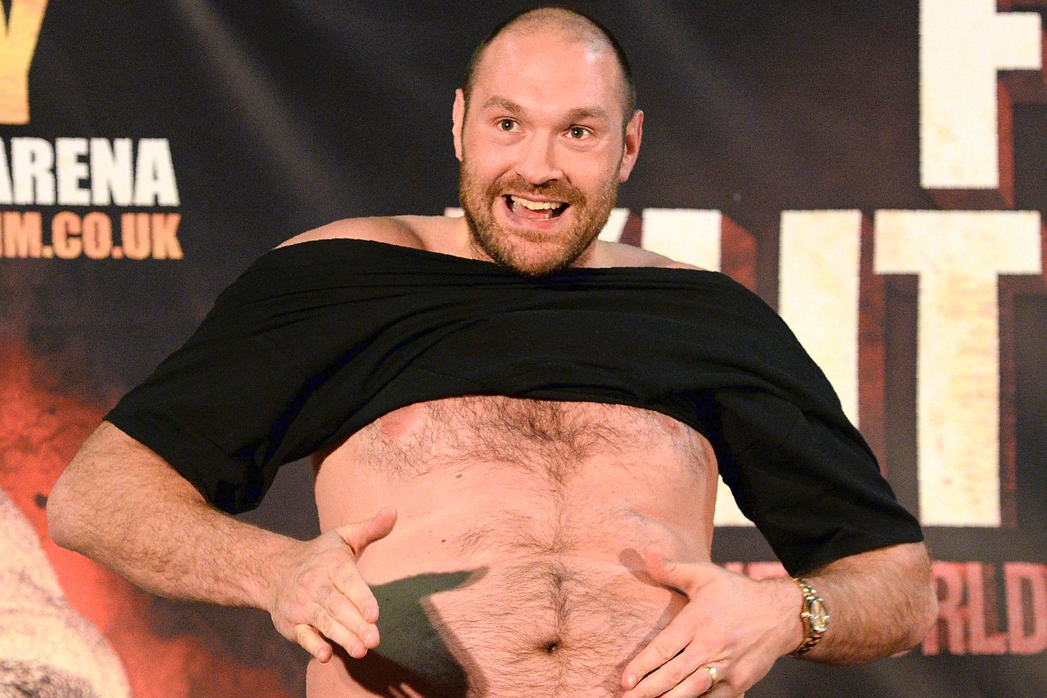 Tyson Fury took his top off and displayed his torso during bizarre press conference ahead of Wladimir Klitschko fight