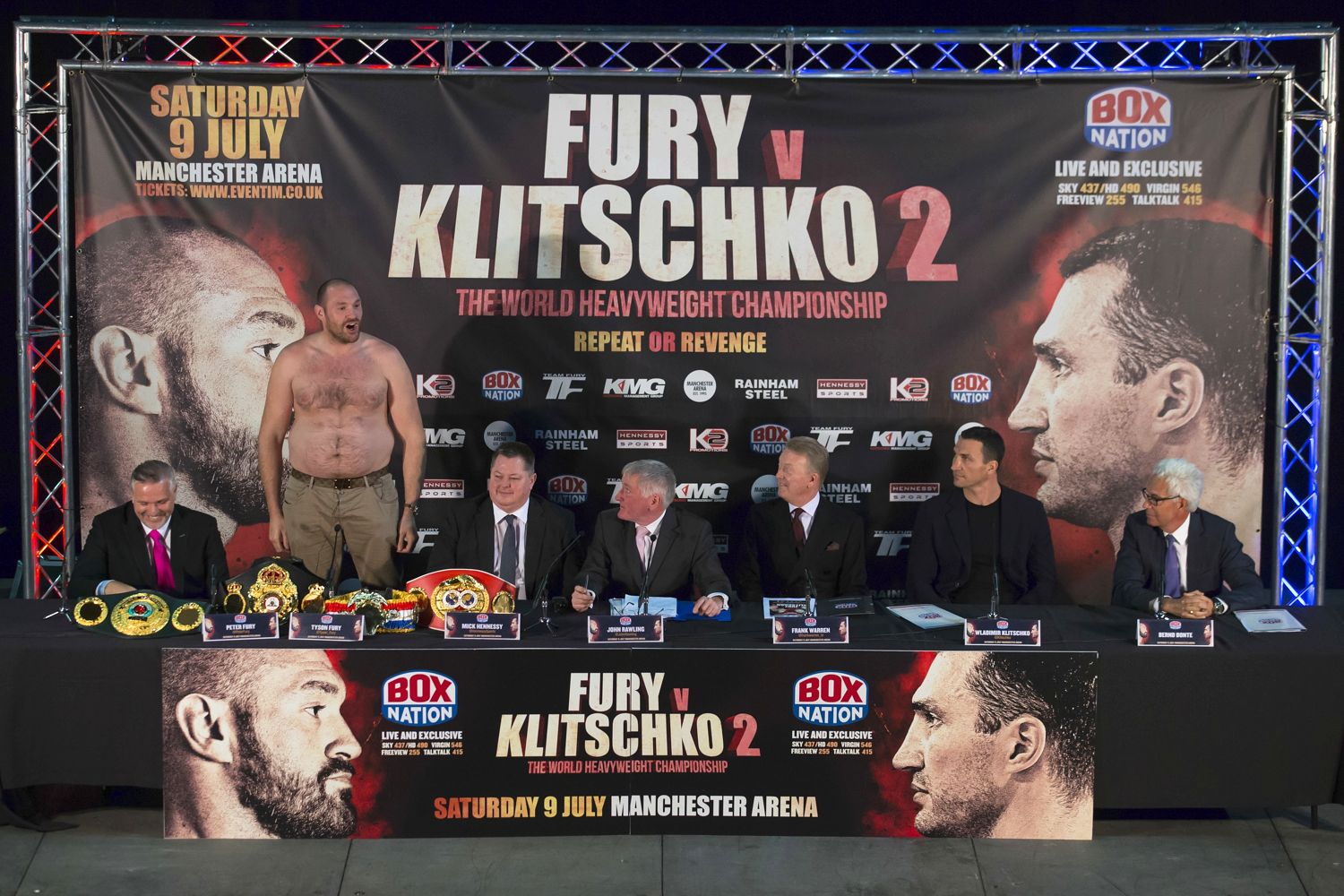 Tyson Fury caused a scene at a press conference for upcoming fight with Wladimir Klitschko by taking his top off to show his lack of conditioning