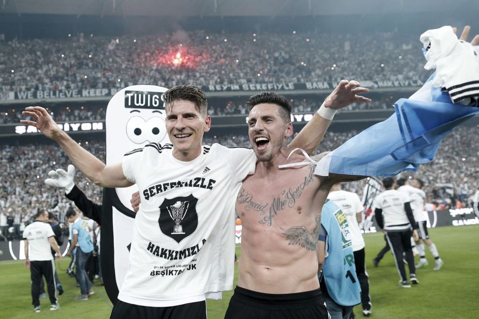  Gomez (left) scored 26 goals as Besiktas won the Turkish title last season