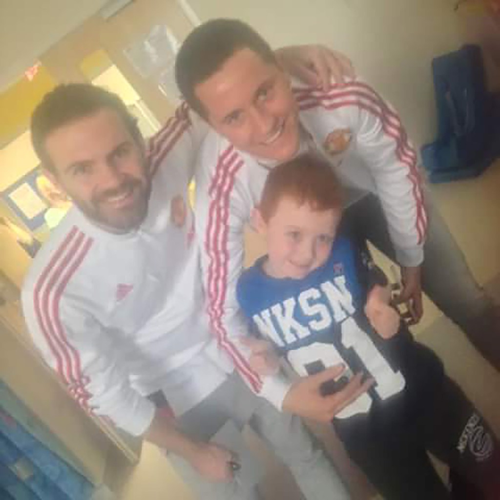  Liam was cheered up while he was being treated by a visit from Manchester United aces Juan Mata and Ander Herrera