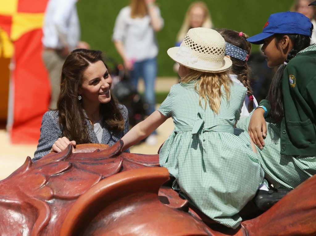 Kate told children at the Hampton Court event that Prince George would love the sleeping dragon