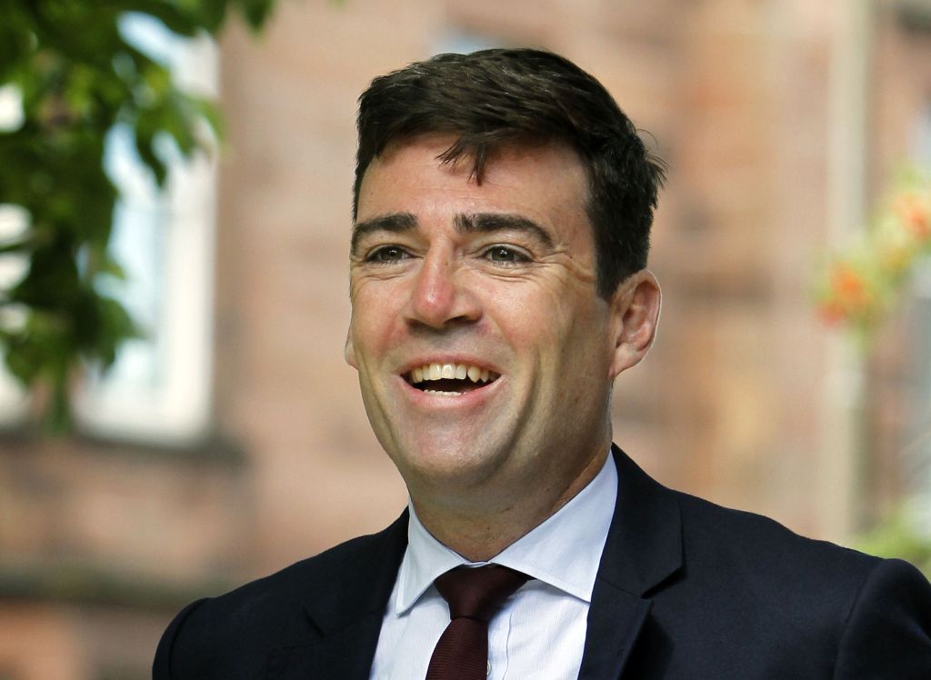 Shadow home secretary Andy Burnham is considering abandoning his frontbench team to run as mayor of Manchester