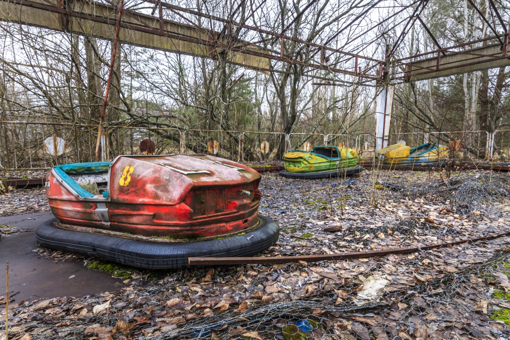 The park's four main attractions - the iconic Ferris wheel, bumper cars, swing boats and a paratrooper ride