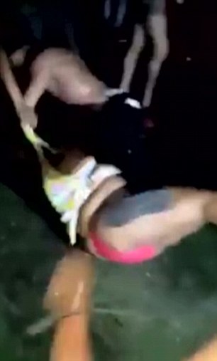  Sickeningly, they try to hoist her dress away from her. The victim is left with her underwear exposed in the nightclub