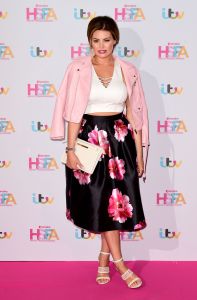 Jess Wright looked stunning in a baby pink jacket and matching skirt