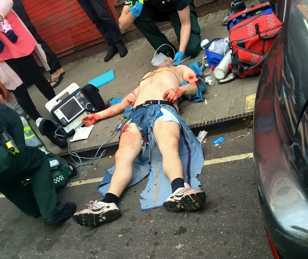 A builder was stabbed and left for dead in the middle of the street on Monday