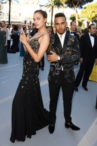  Russian Model, Irina Shayk, poses with F1 star Lewis Hamilton at charity bash