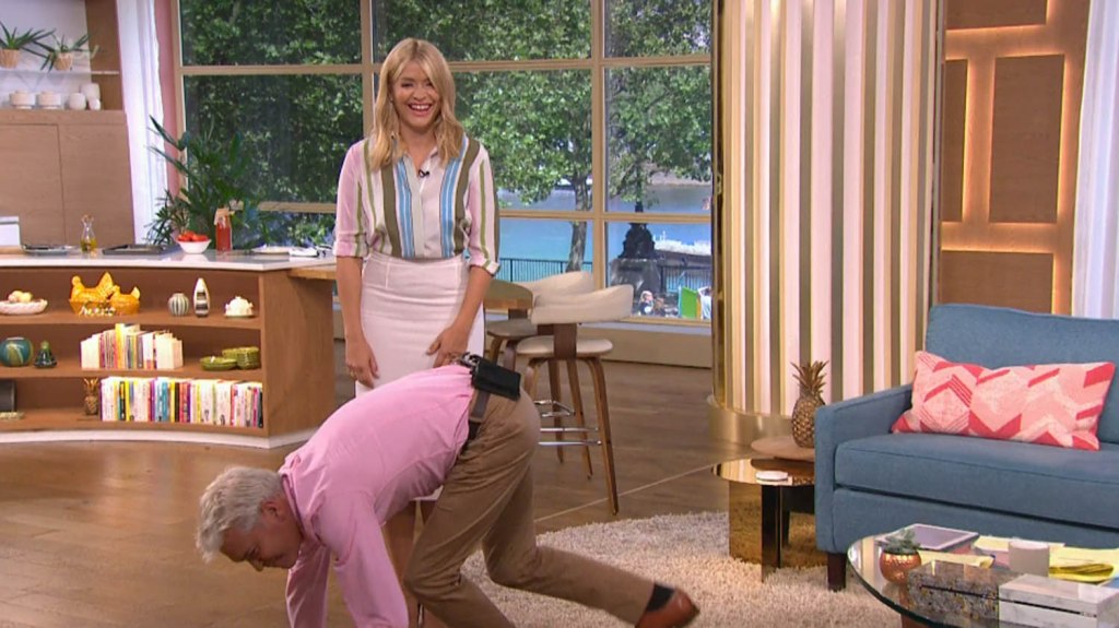  Holly Willoughby looked on as Phil was brought to his knees