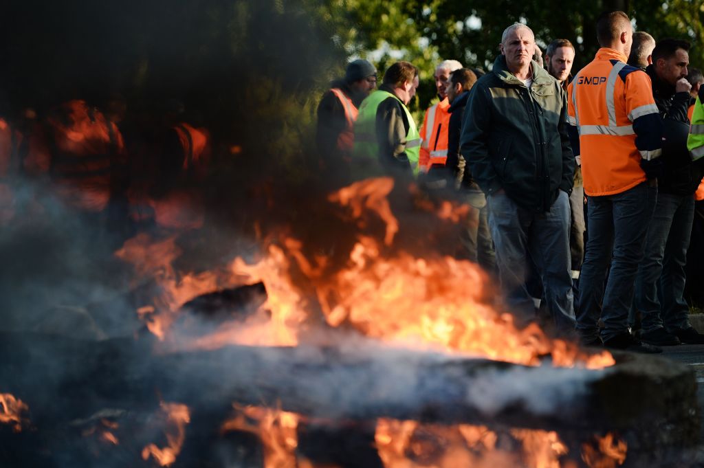  Riot police set off tear gas and used water cannons to try and break up the violence on the picket lines and service stations