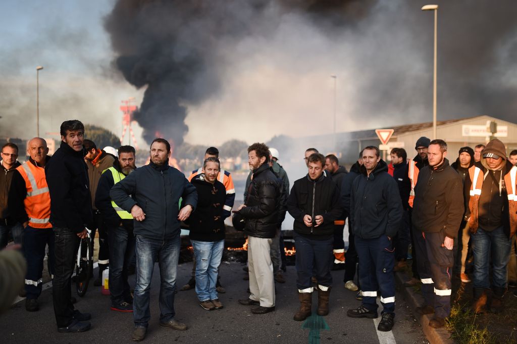  Workers on strike block the access to the harbour of Saint-Nazaire, pictured today