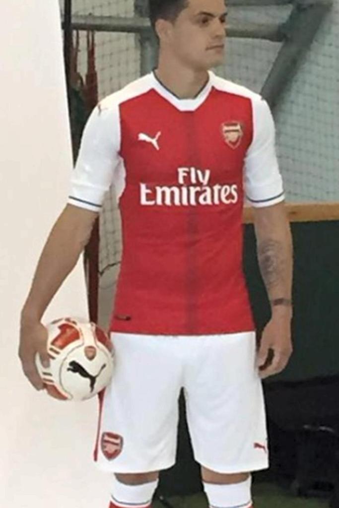  Granit Xhaka appears to be photographed modelling Arsenal's latest kit