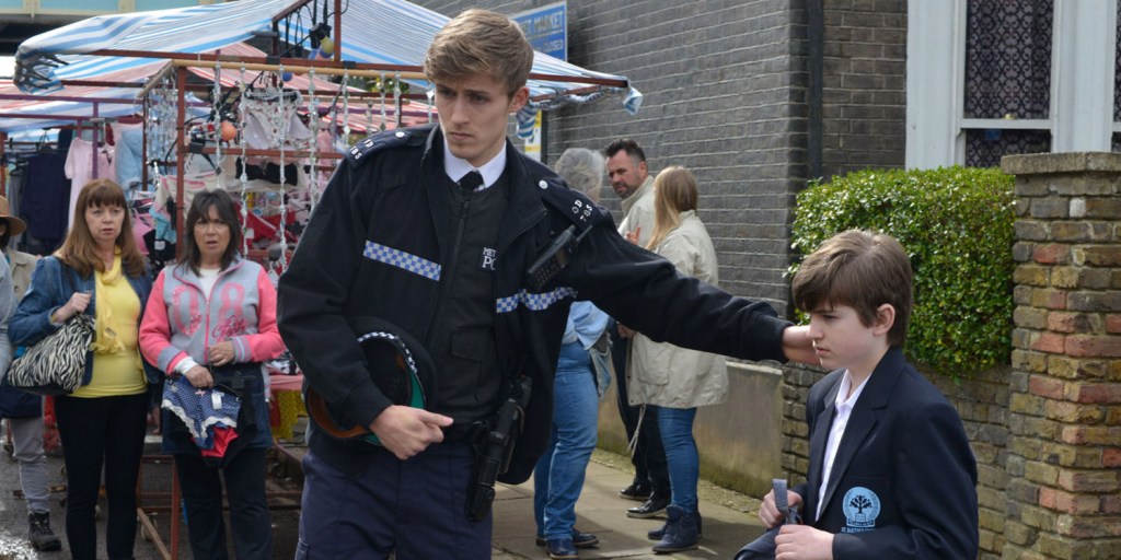  The actor is seen being dragged off by police