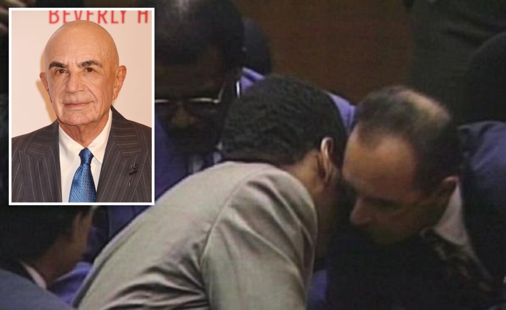 OJ Simpson whispers to Robert Shapiro after not guilty verdict read in court