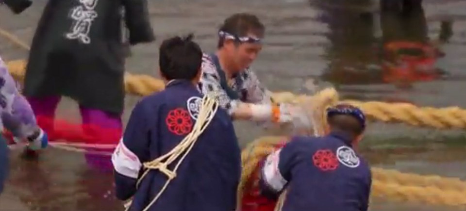  The logs are then tipped into the water, again with people astride them