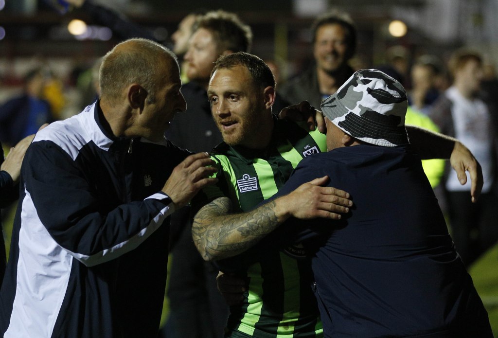 AFC Wimbledon celebrate League Two play-off semi-final aggregate victory over fellow outsiders Accrington Stanley