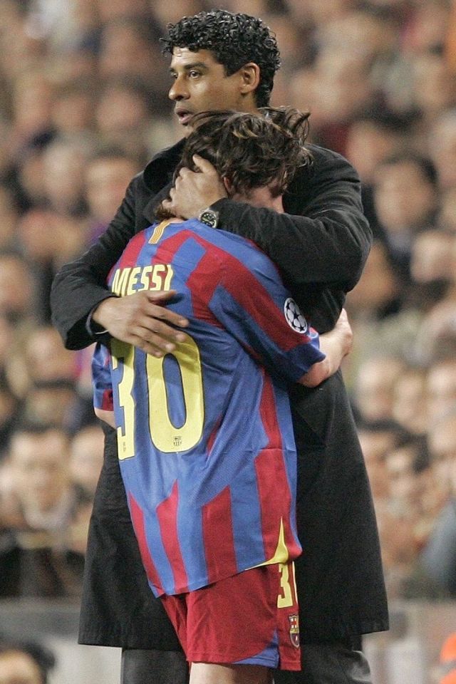 Frank Rijkaard with a young Lionel Messi, during his time as manager of Barcelona