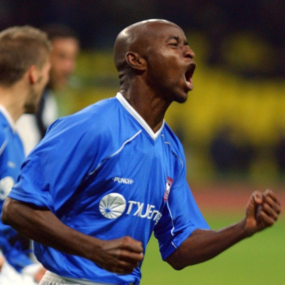 Finidi George celebrates scoring for Ipswich in the Uefa Cup against Torpedo Moscow