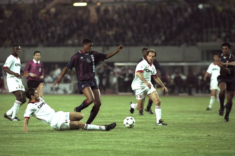 Patrick Kluivert creates some space in the AC Milan penalty area to score the winning goal in Vienna