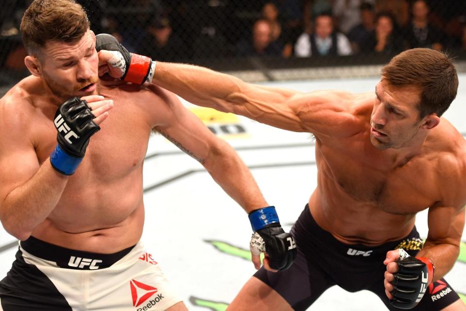 Luke Rockhold was stunned by Bisping in the first round and rescued from his attack 