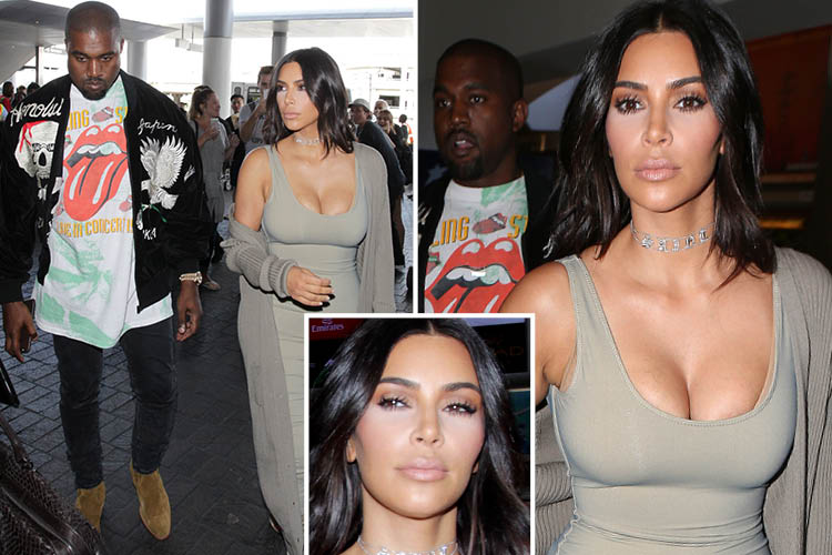 Kim Kardashian flaunted her cleavage as she made her way through LAX with Kanye West on Sunday