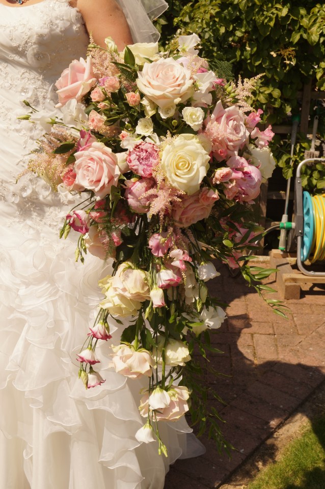  The gorgeous blooms were gifted to the couple