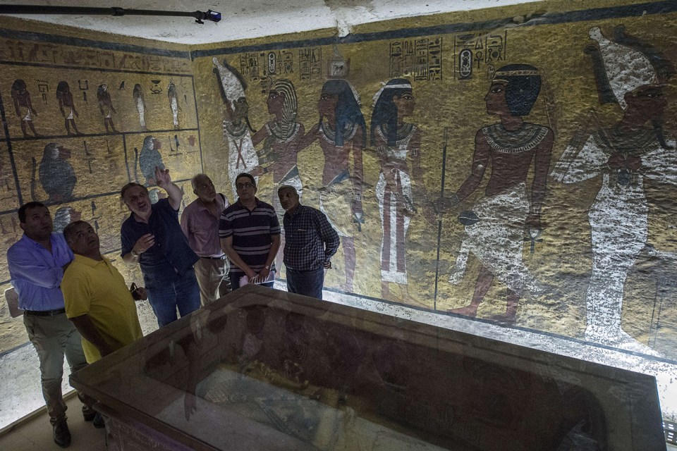  The golden sarcophagus of King Tutankhamun in his burial chamber