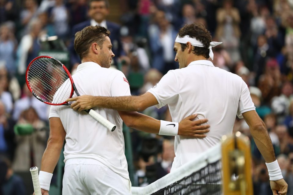  Roger Federer congratulates Marcus Willis after the Brit fought back well in defeat