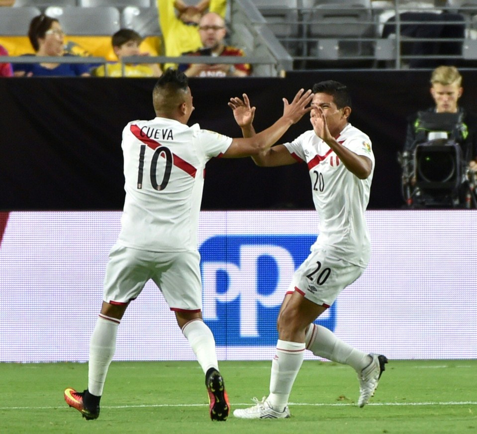 Christian Cueva celebrates scoring Peru's opener in their 2-2 draw with Ecuador