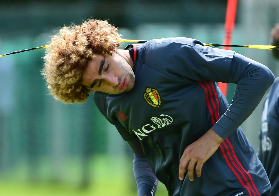 Belgium's midfielder Marouane Fellaini attends a training session in Le Haillan during the Euro 2016 football tournament, on June 15, 2016. / AFP / EMMANUEL DUNAND (Photo credit should read EMMANUEL DUNAND/AFP/Getty Images)