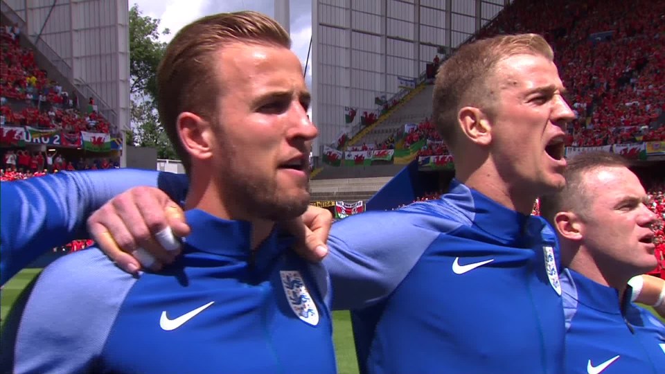  England keeper Joe Hart belts out the national anthem before kick-off