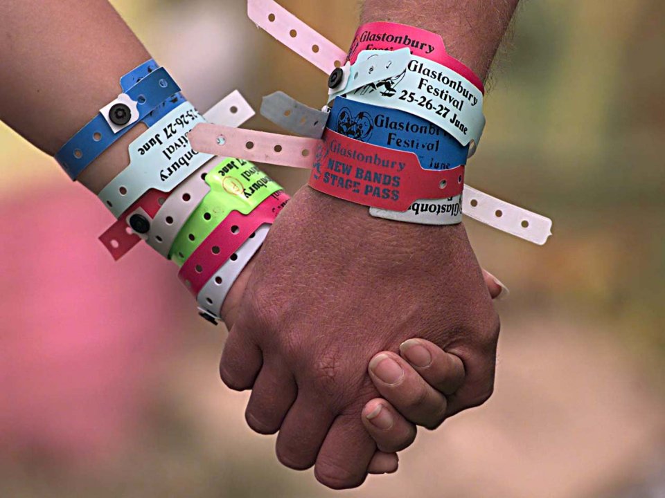  Glastonbury festival-goers proudly sport their numerous wristbands but keeping them on could pose a health hazard