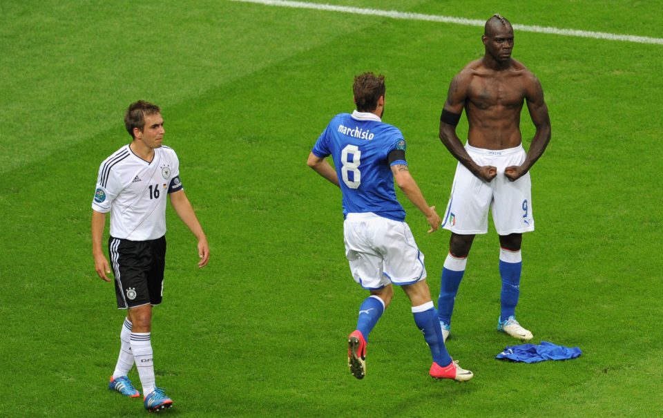  Malotelli scored his sides second goal against Germany in the semi-finals of Euro 2012 and stripped of his top to celebrate with team-mate Claudio Marchisio