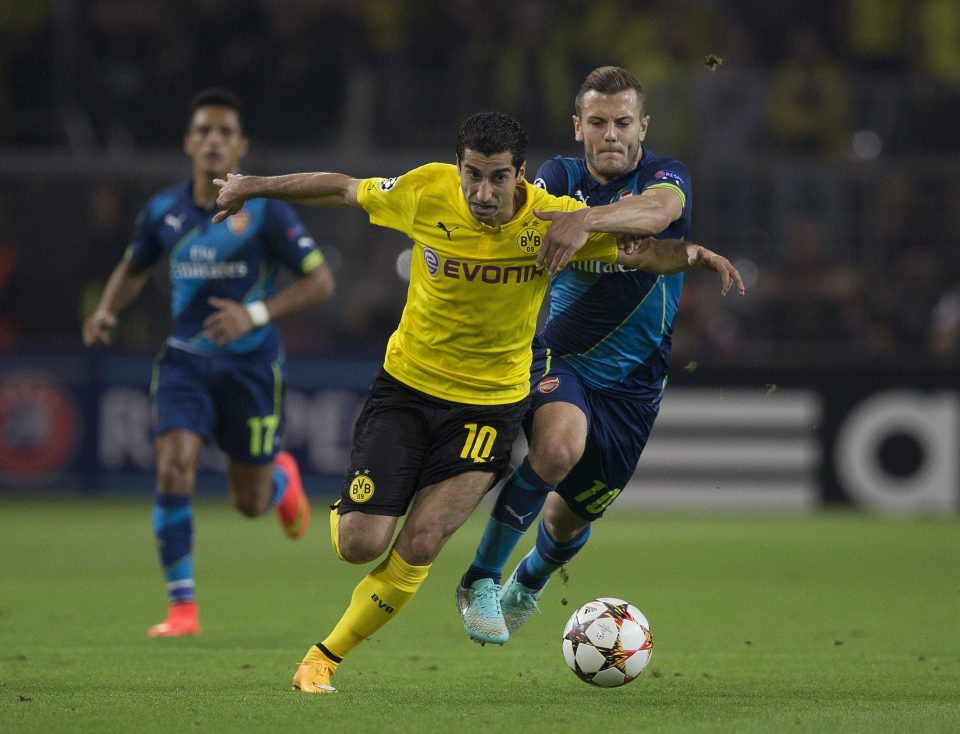 Henrikh Mkhitaryan in action against Arsenal in the Champions League