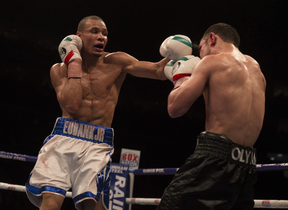  Chris Eubank Jr lands a blow on Dmitry Chudinov during his win in February 2015