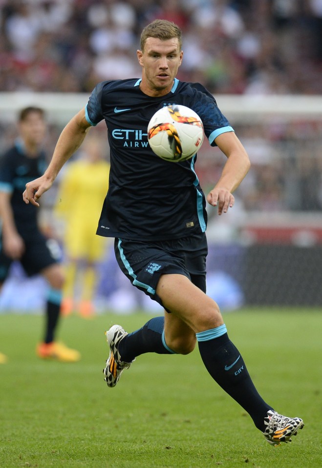  Bosnian striker Edin Dzeko in action during his time with Manchester City