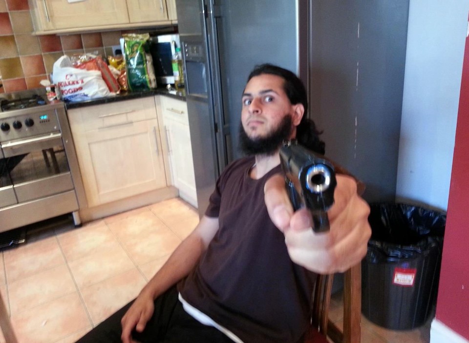  Haseeb Hamayoon, 28, seen brandishing a pistol at the camera, was said to have warned President Obama 'is going to die soon'