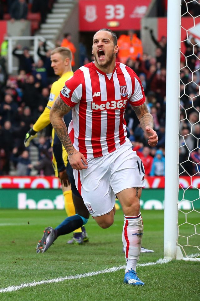  Marko Arnautovic celebrates after scoring past Manchester City's Joe Hart