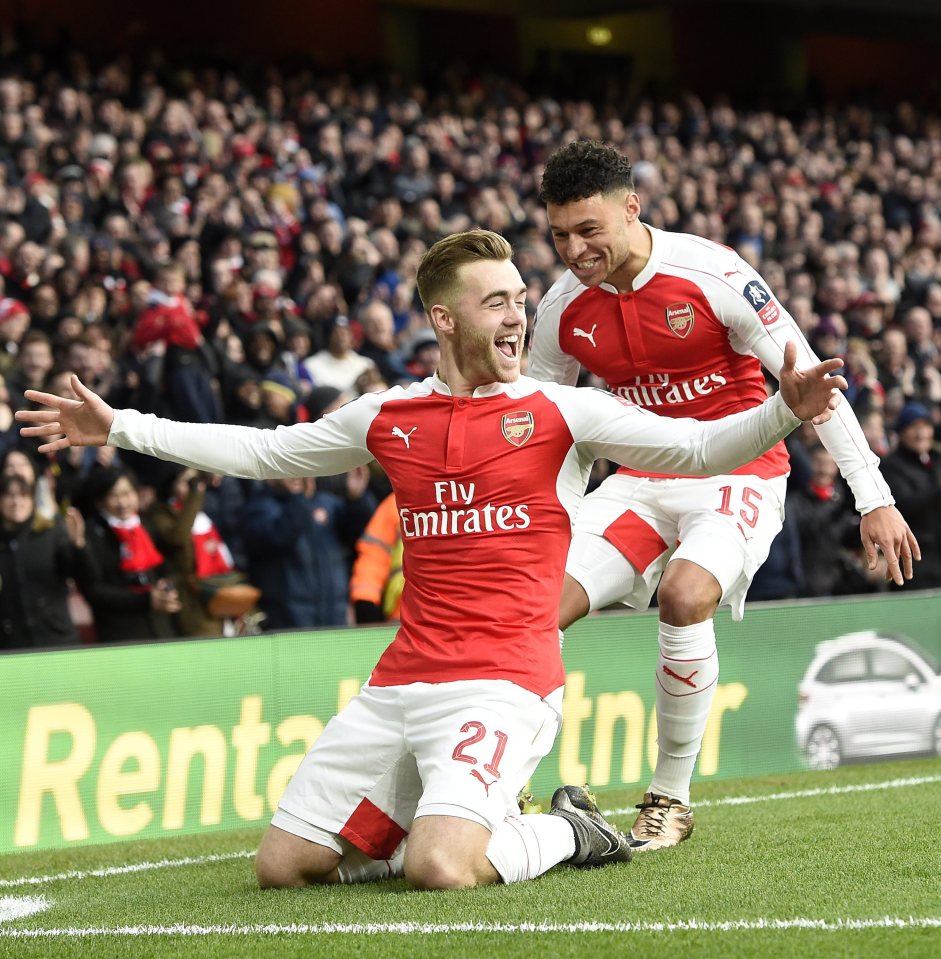  Calum Chambers celebrates with fellow Saints old-boy Alex Oxlade-Chamberlain