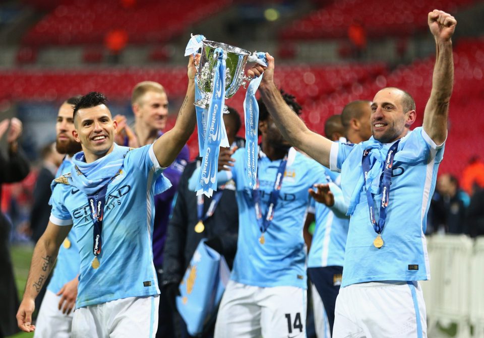  Zabaleta celebrates with countryman Sergio Aguero after winning the League Cup last season