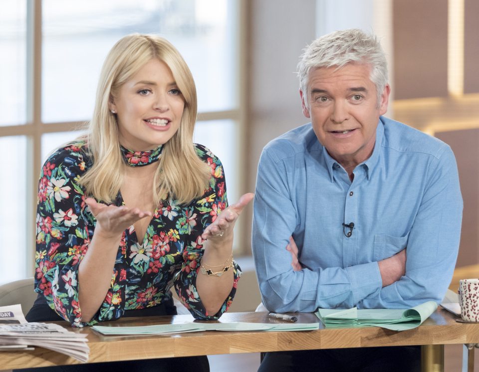  Dynamic duo ... Holly says fellow This Morning presenter Phillip Schofield is a terrific dad