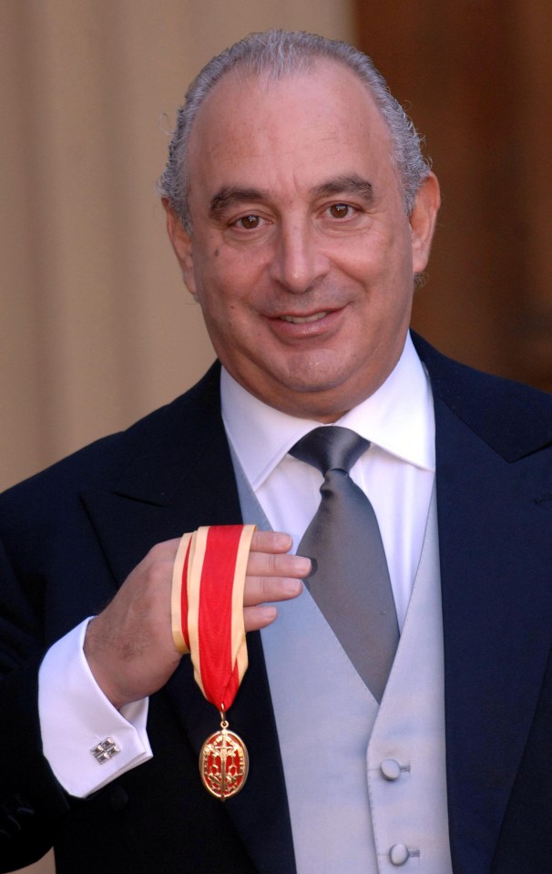 Sir Philip Green poses outside Buckingham Palace