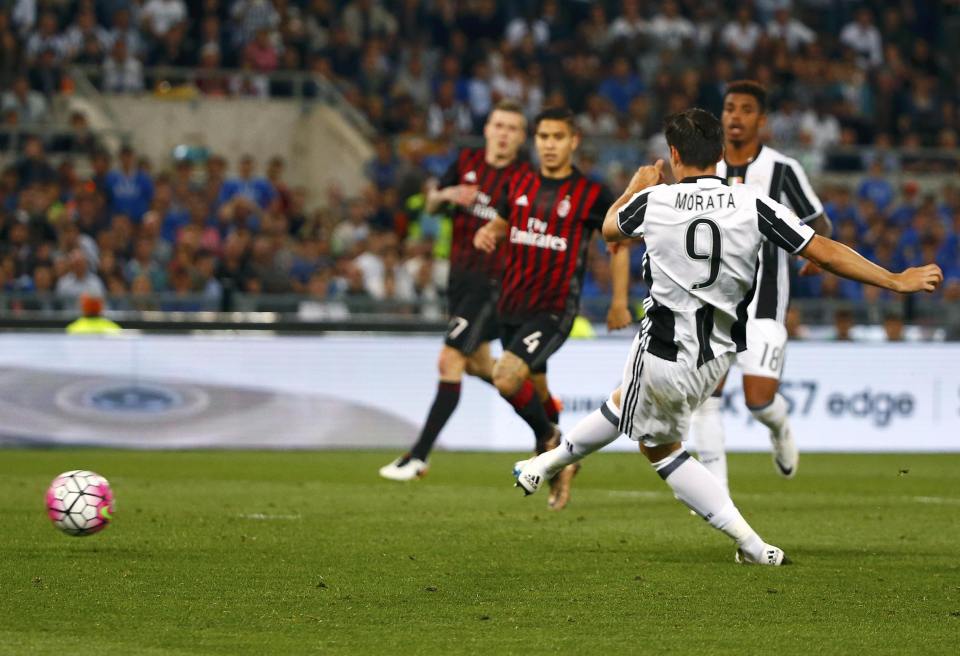 Football Soccer - Juventus v Milan - Italian Cup Final - Olympic stadium, Rome, Italy - 21/05/16 Juventus' Alvaro Morata scores a goal against AC Milan. REUTERS/Tony Gentile