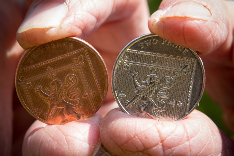  The coin was minted in error and should have looked like the normal 2p on the left